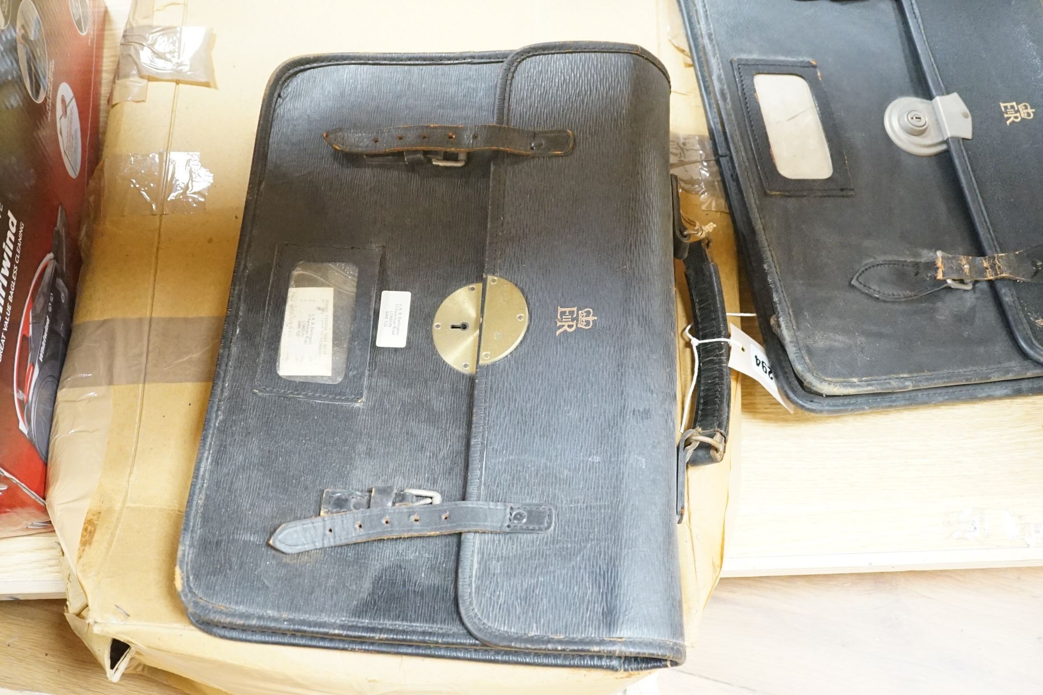 Three black leather civil service attache cases with ERII monogram